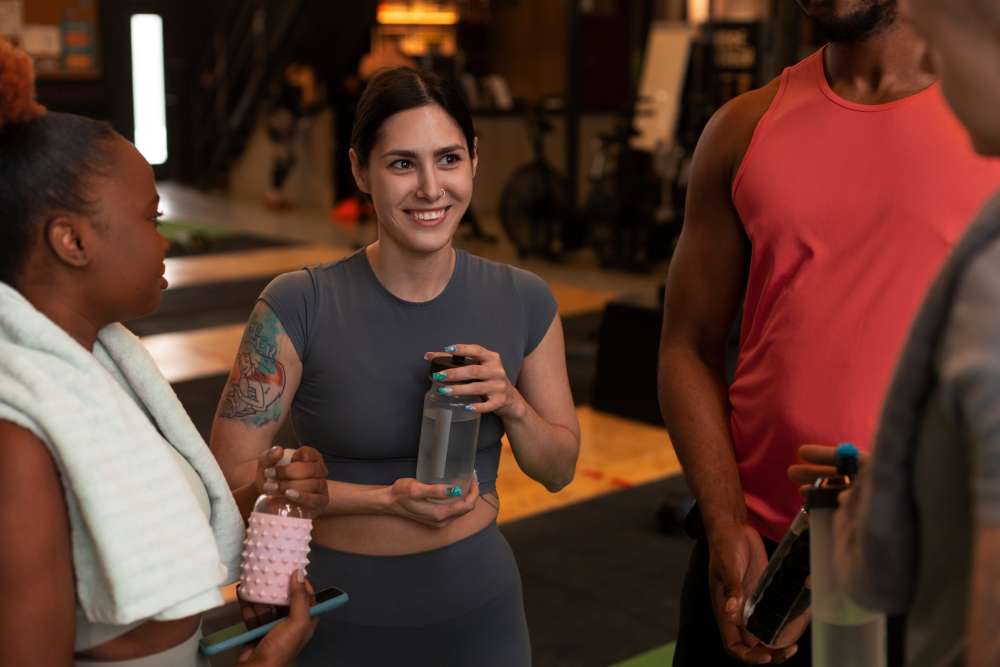 Gym members attending to an event in the fitness business