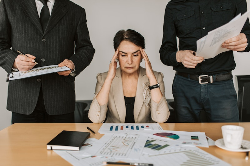 A woman tensed with all the paperwork