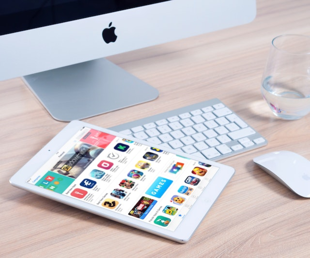 A tablet screen with multiple apps displayed on it