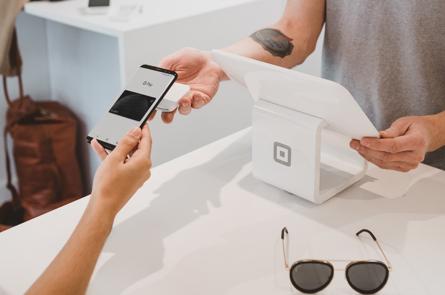 paying Google pay on phone payment sunglasses