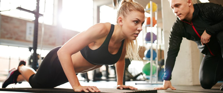 woman planing in the gym