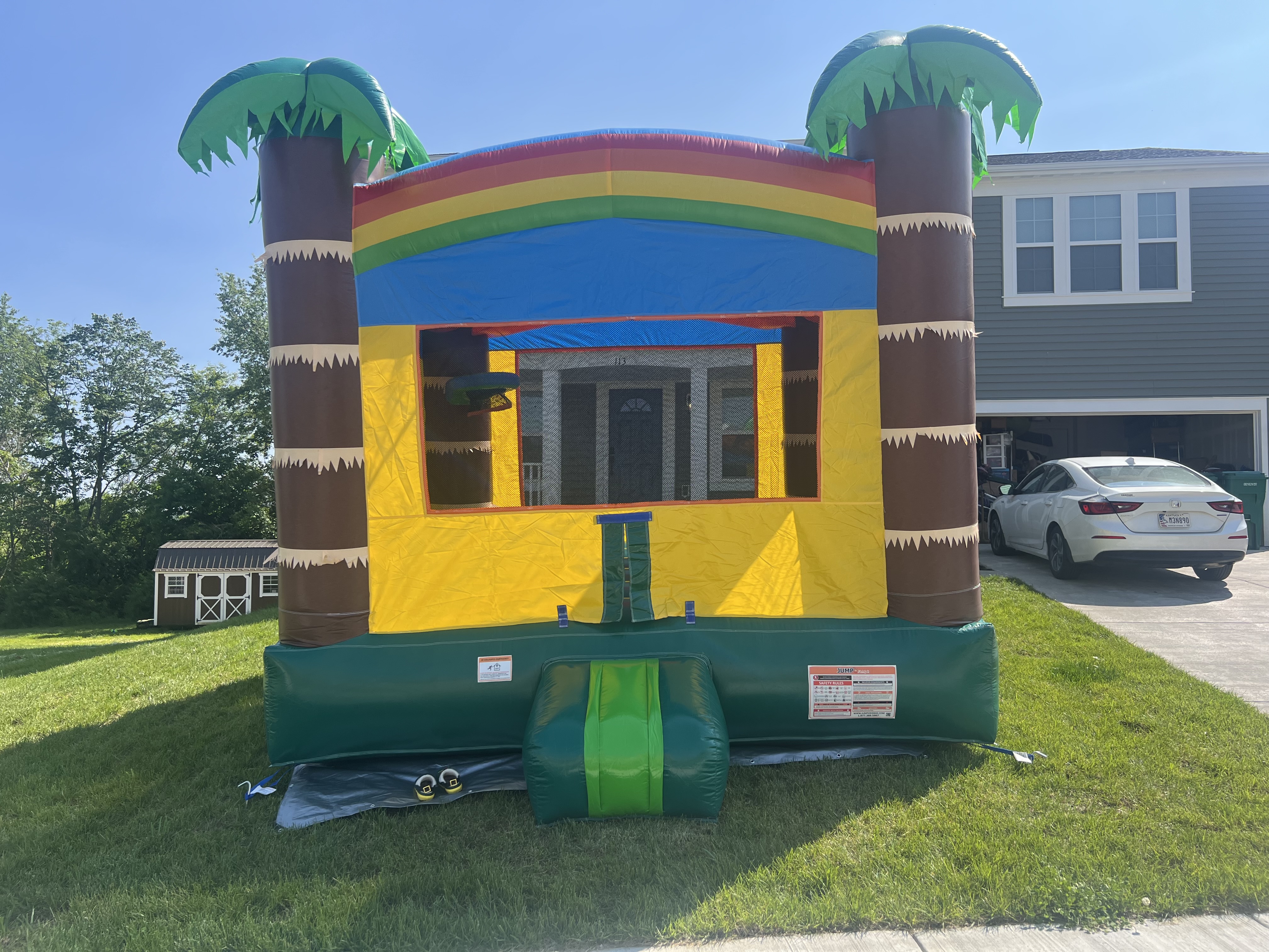 Jungle Bounce House with Basketball Hoop