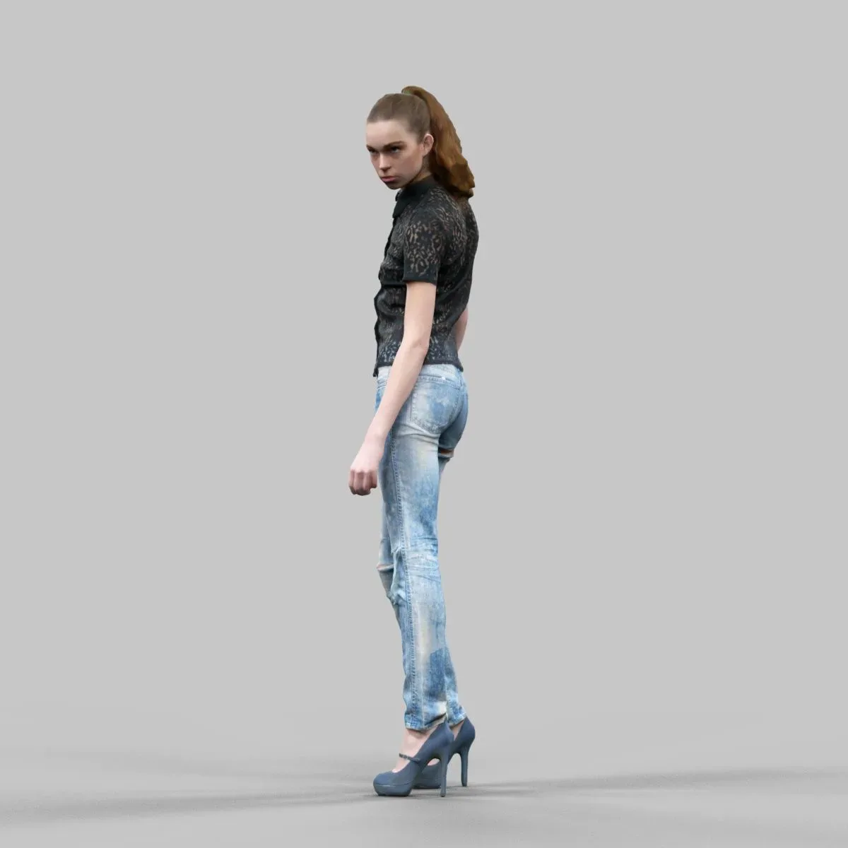 Girl in jeans and black top posed