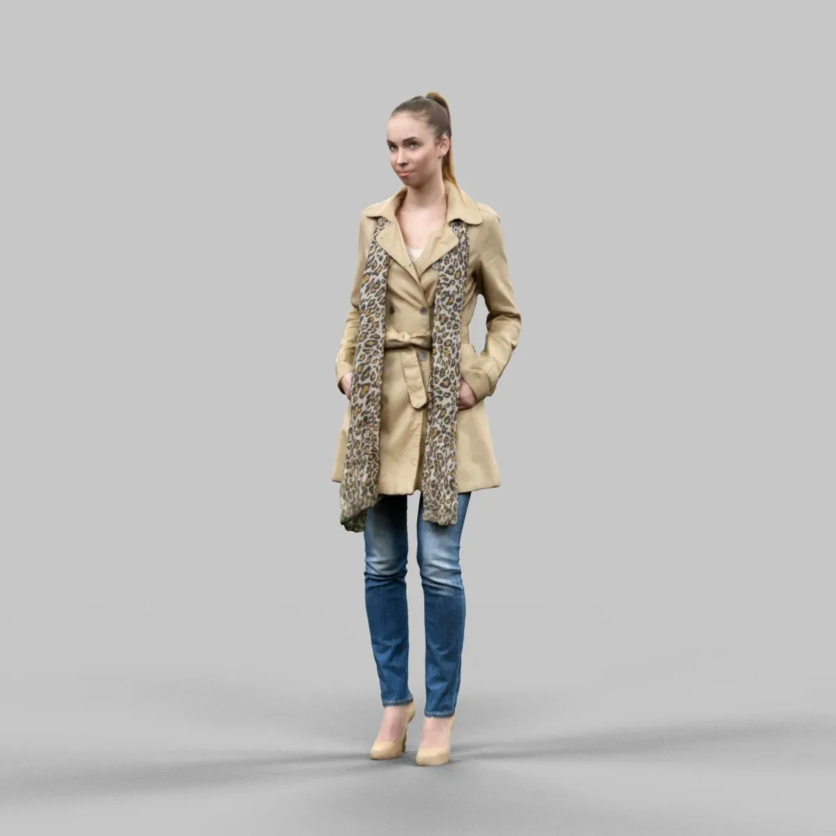 Woman in beige coat and scarf