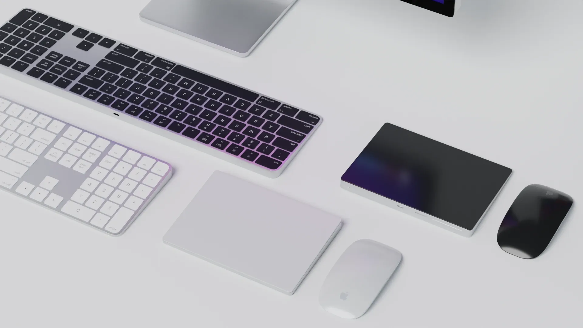 Mac mini 2022 with keyboard mouse trackpad and airPods Max