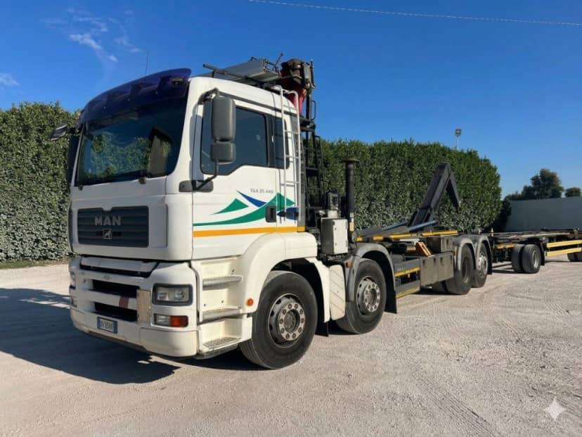 MAN TGA 35.440 USATO SCARRABILE CON GRU RETROCABINA E POLIPO 6 PALE