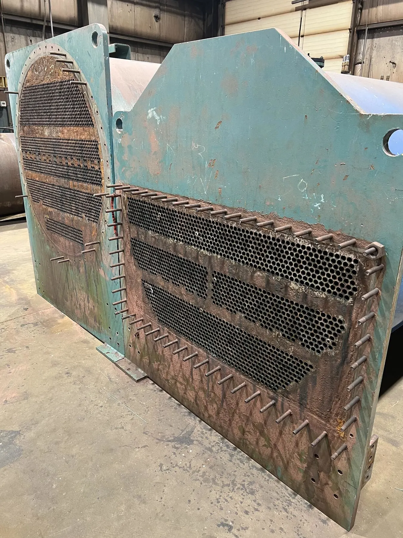 Rectangular tubesheet with heavy rust before coating