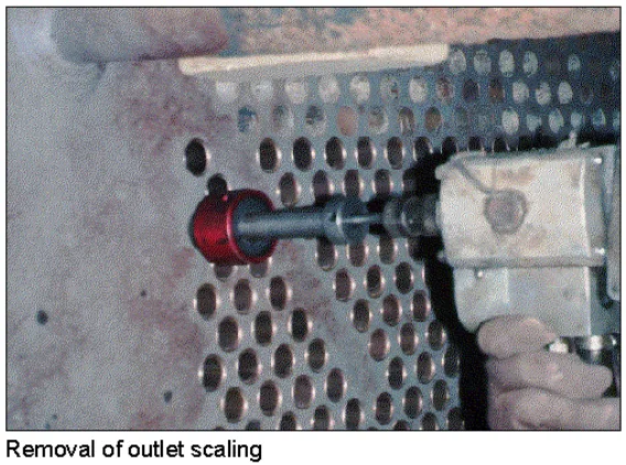 Removal of outlet scaling