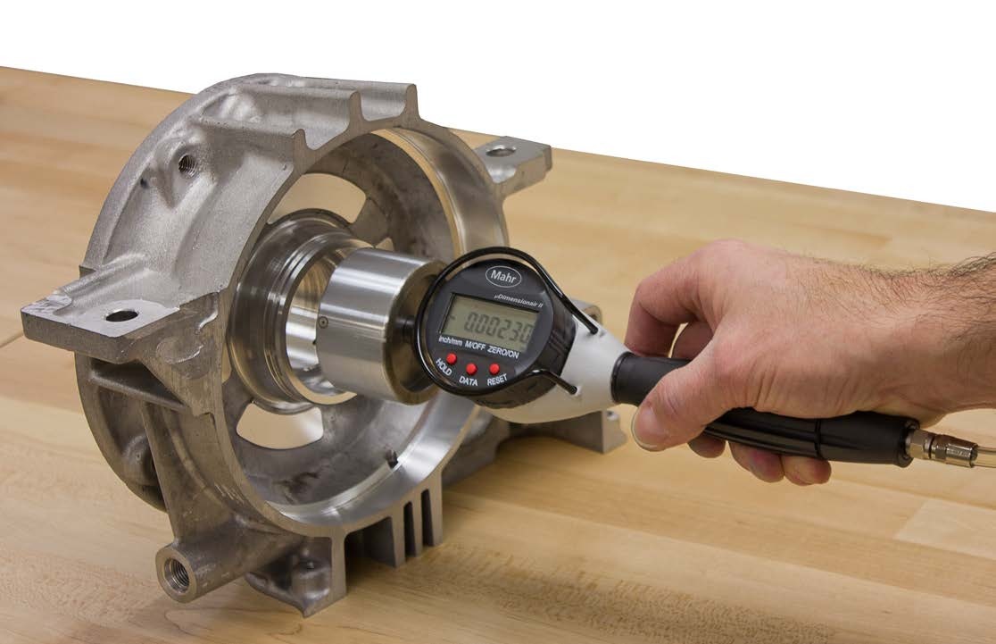 Mahr µDimensionair II handheld air gage measuring a bore in a motor housing