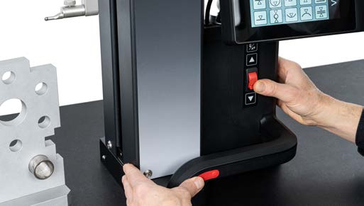 Operator moving the Digimar 817 CLT using the handle with air-bearing key