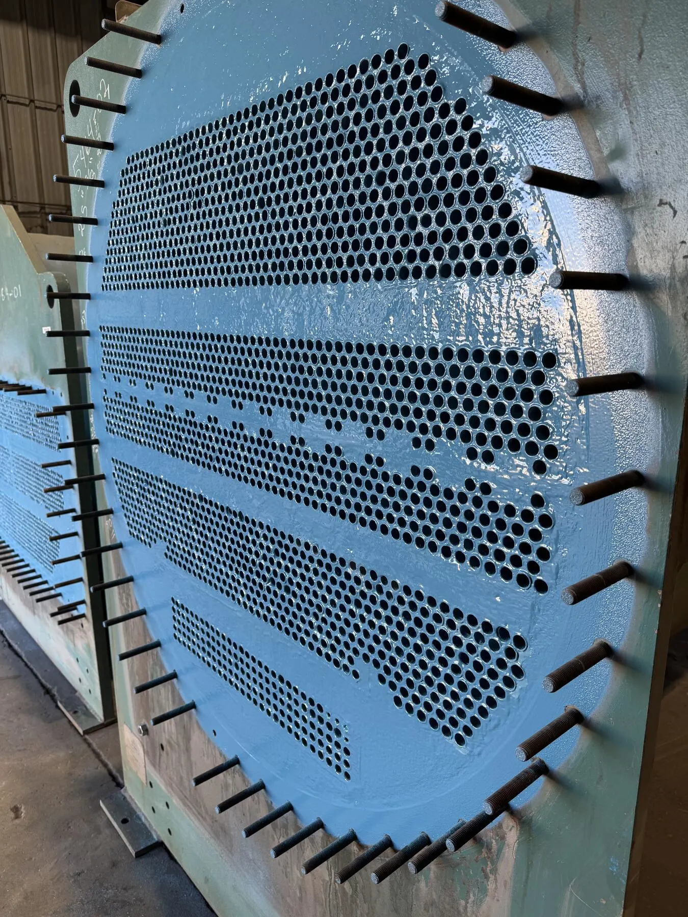 Completed round tubesheet coating