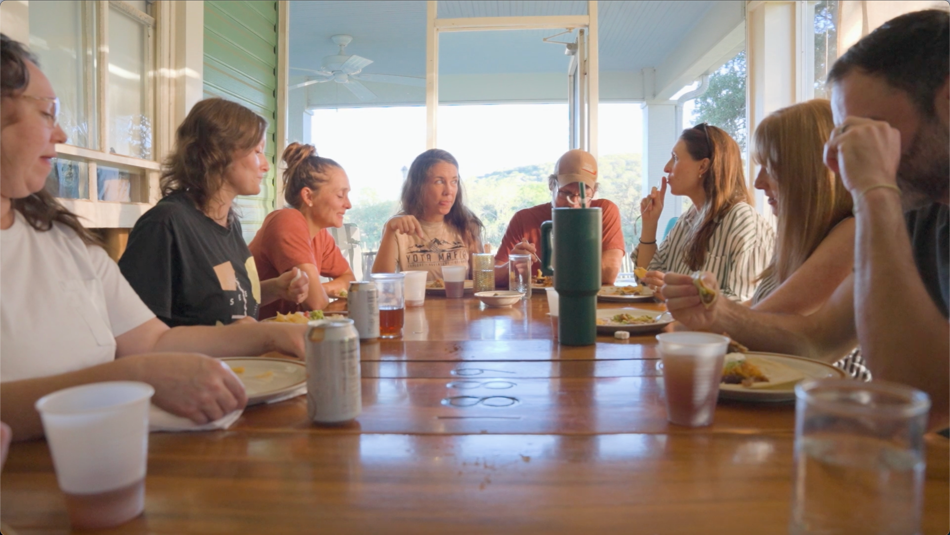 Community gathering around the table at Annandale Ranch Retreat