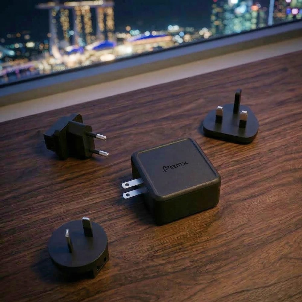 GaNsta with foldable US plug and EU, UK, AU travel adapters