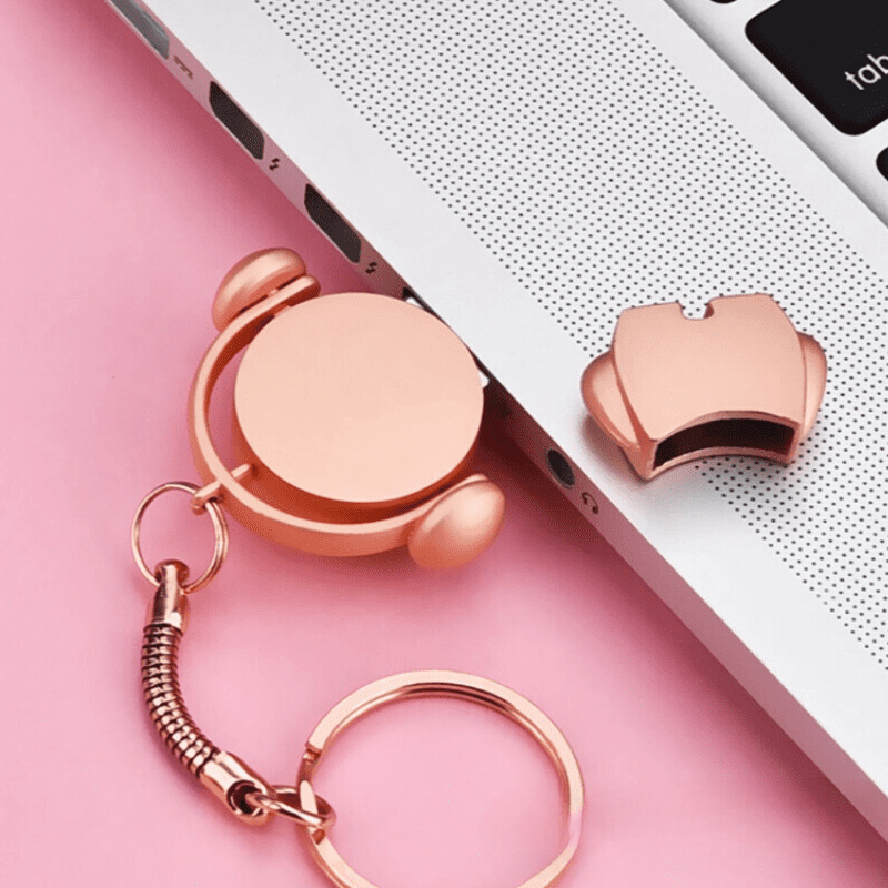 Stylish rose gold accessories on a soft pink background, perfect for modern lifestyle and gifts.