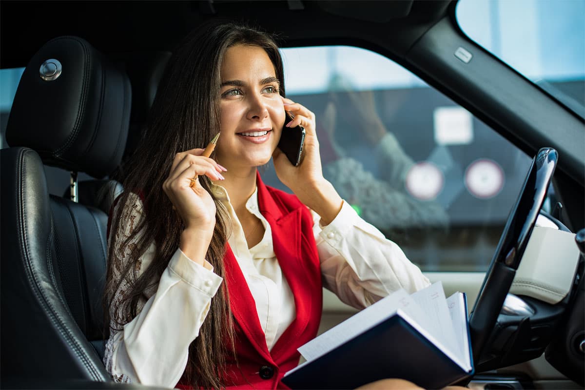 Mobile notary professional on the go, coordinating a notary appointment in Los Angeles