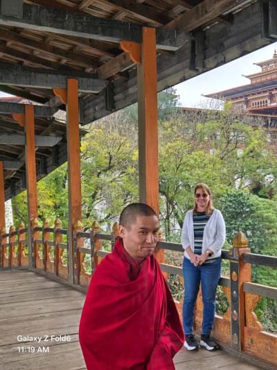 Punakha Dzong with amazing wooden bridge and our guide ysuapg