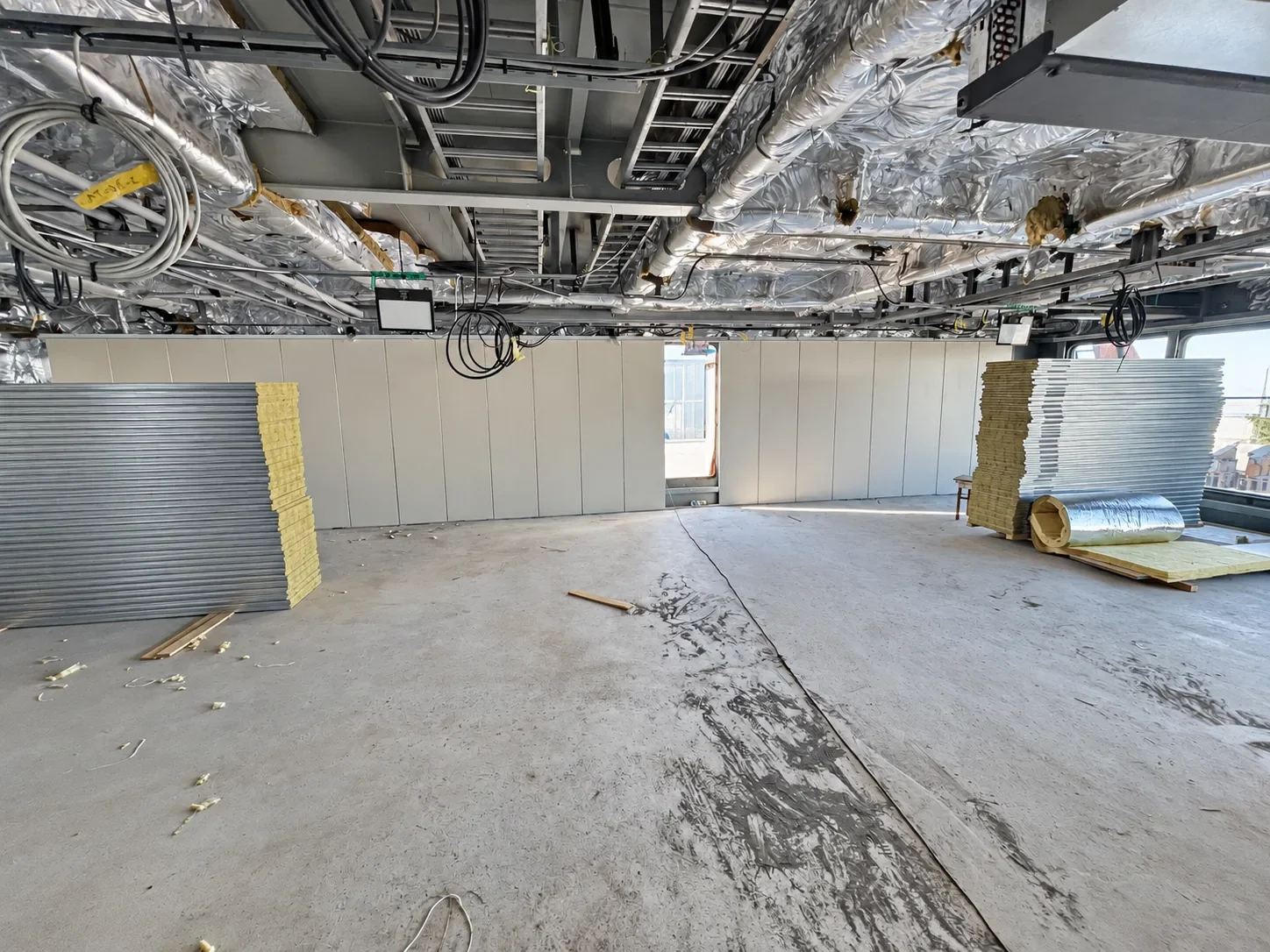 Hospital vessel marine interior material package coordinated with overhead services