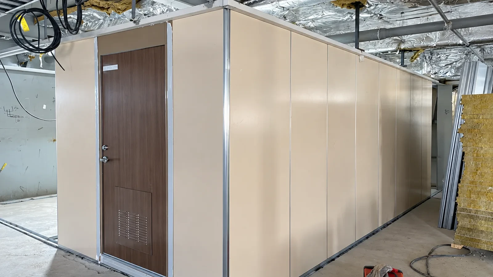 Hospital vessel interior materials with marine panels and cabin doors during installation