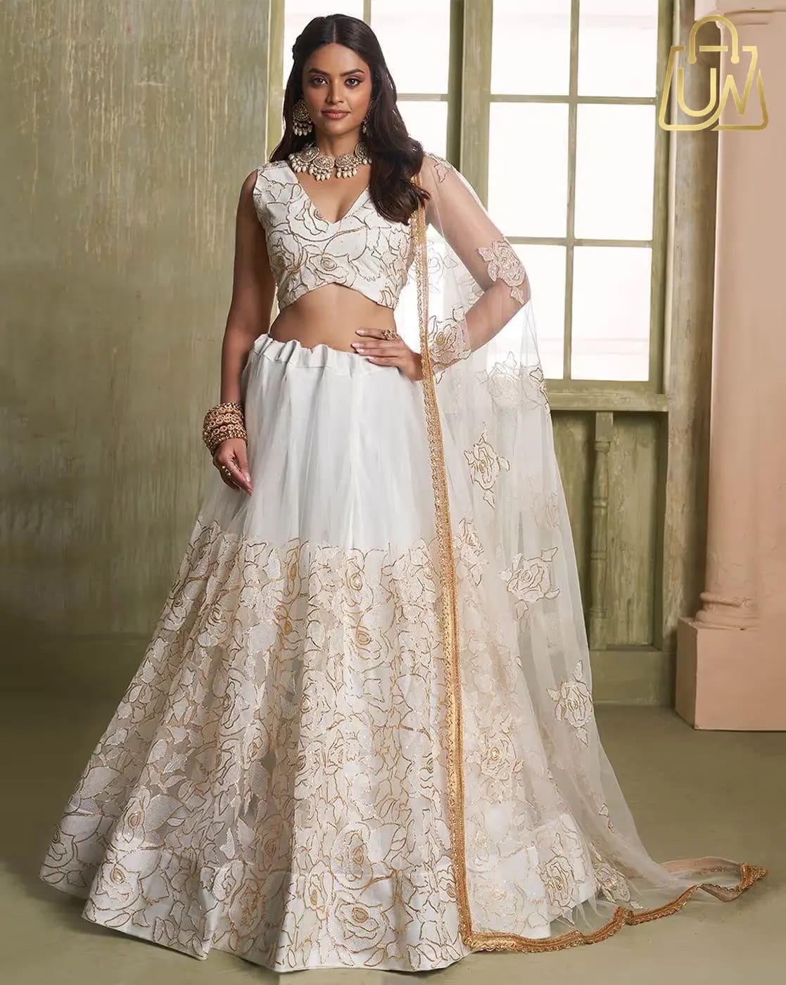 TANUKA Women Embroidered Flared Lehenga Choli Set with Dupatta