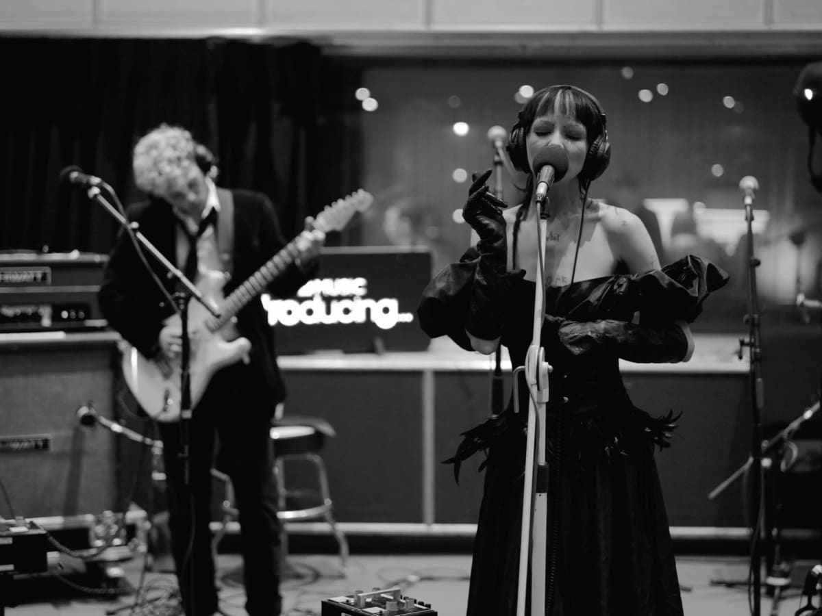 Wide of the BBC Maida Vale live room: the guitarist on one side, Bambie Thug at the microphone on the other, under the BBC Music Introducing sign