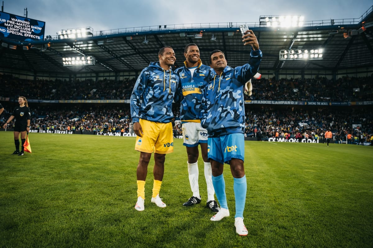 Gilberto Silva, Dida and Serginho take a selfie on the pitch at the Game4Ukraine legends charity match, Stamford Bridge, London, 5 August 2023.