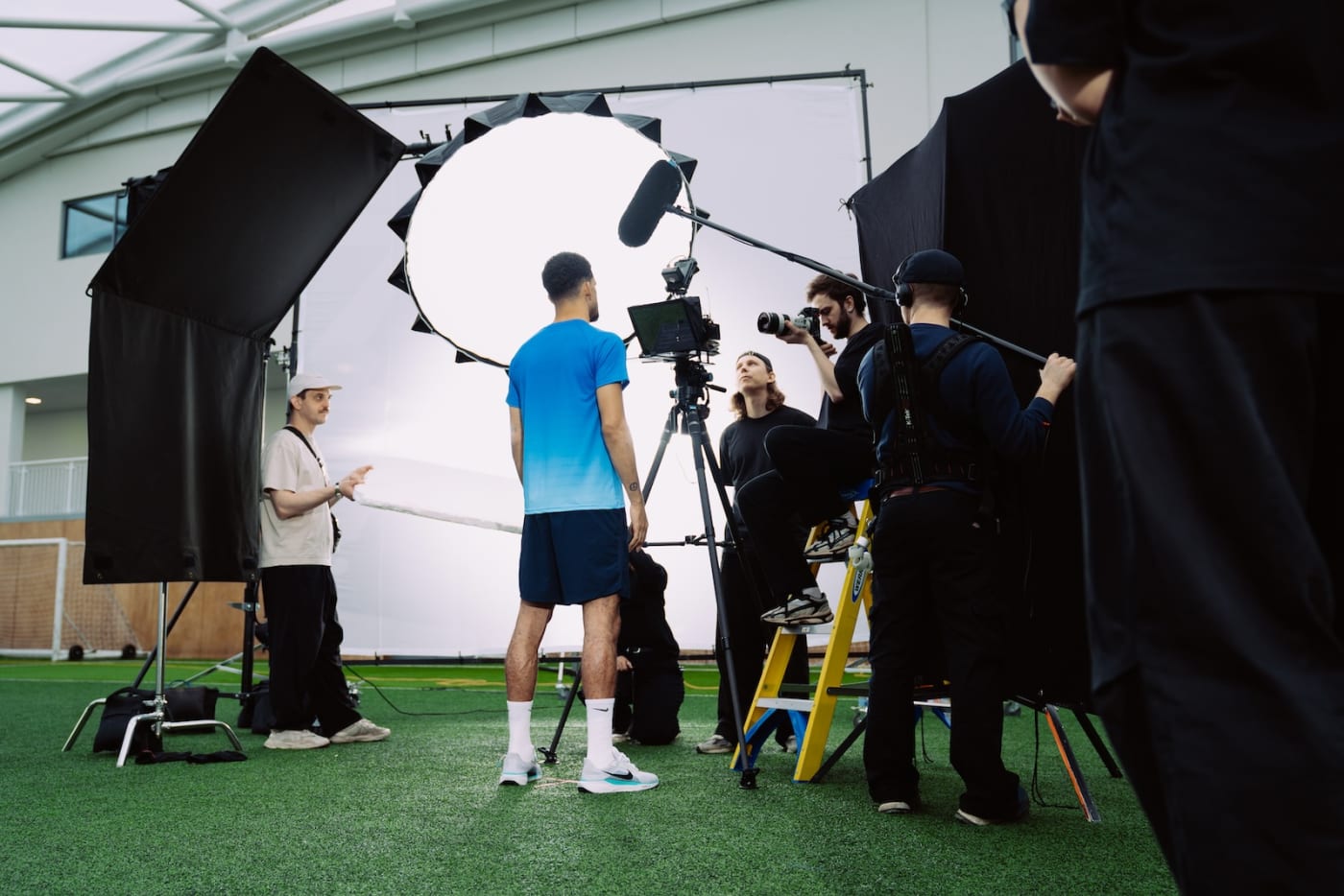 A lighting set-up built on an indoor pitch before filming starts