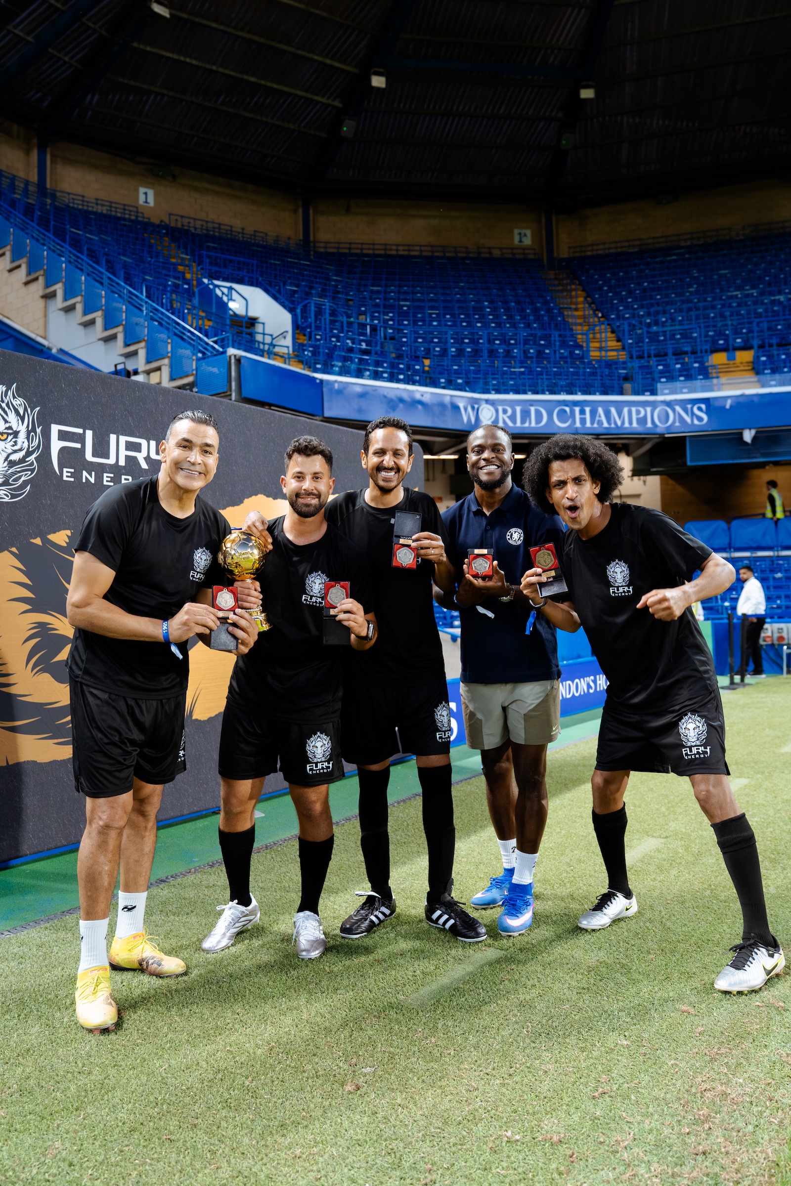 Fury Energy team photographed pitchside at Stamford Bridge, Chelsea FC