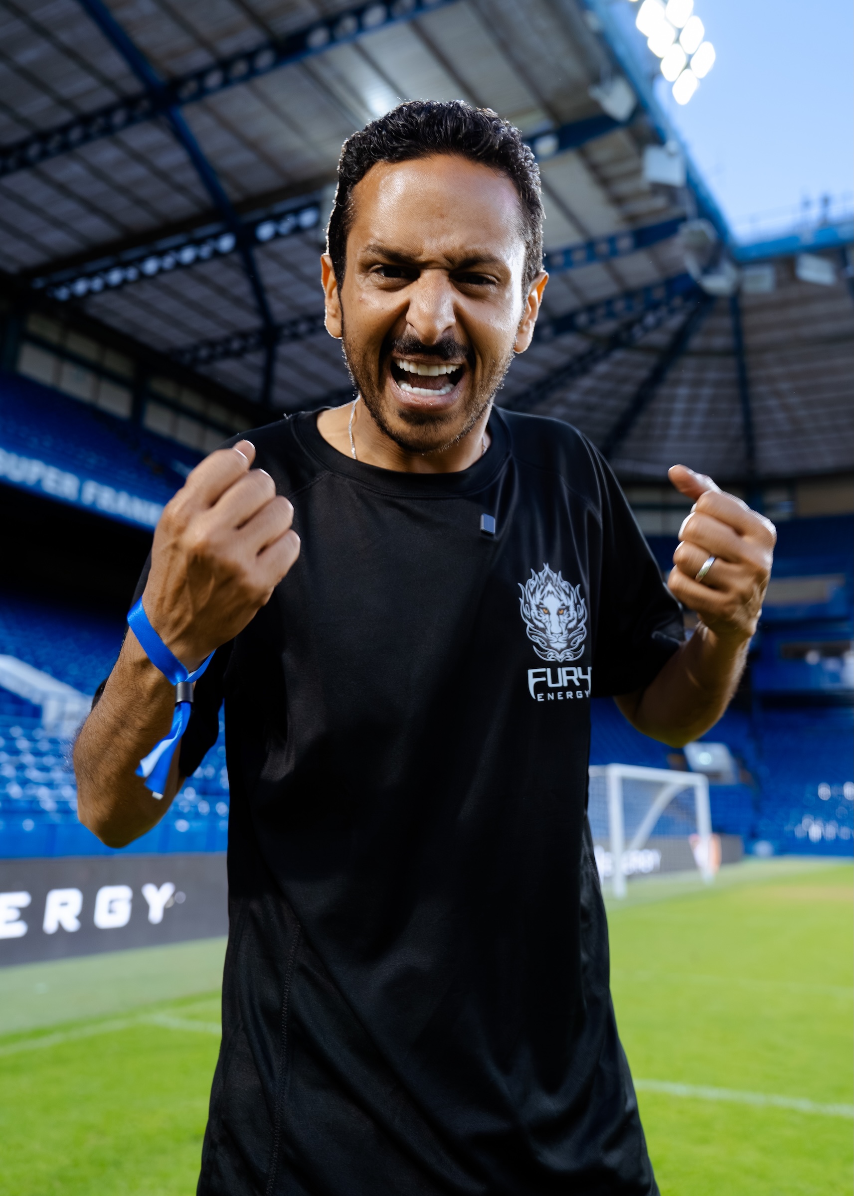 Marwan Serry celebrating pitchside at the Fury Energy x Chelsea FC event, Stamford Bridge
