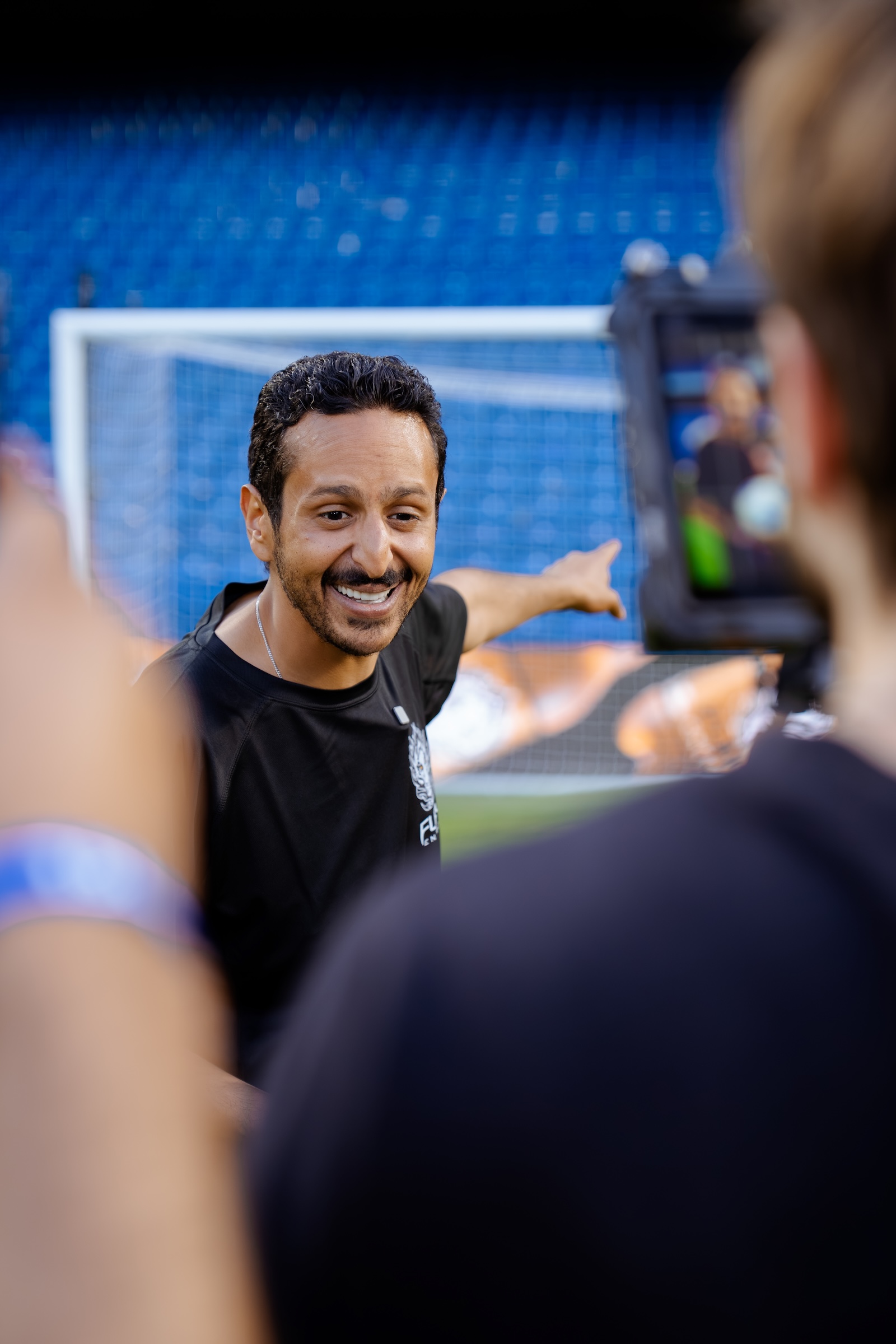 Marwan Serry being interviewed on camera at Stamford Bridge, Fury Energy x Chelsea FC
