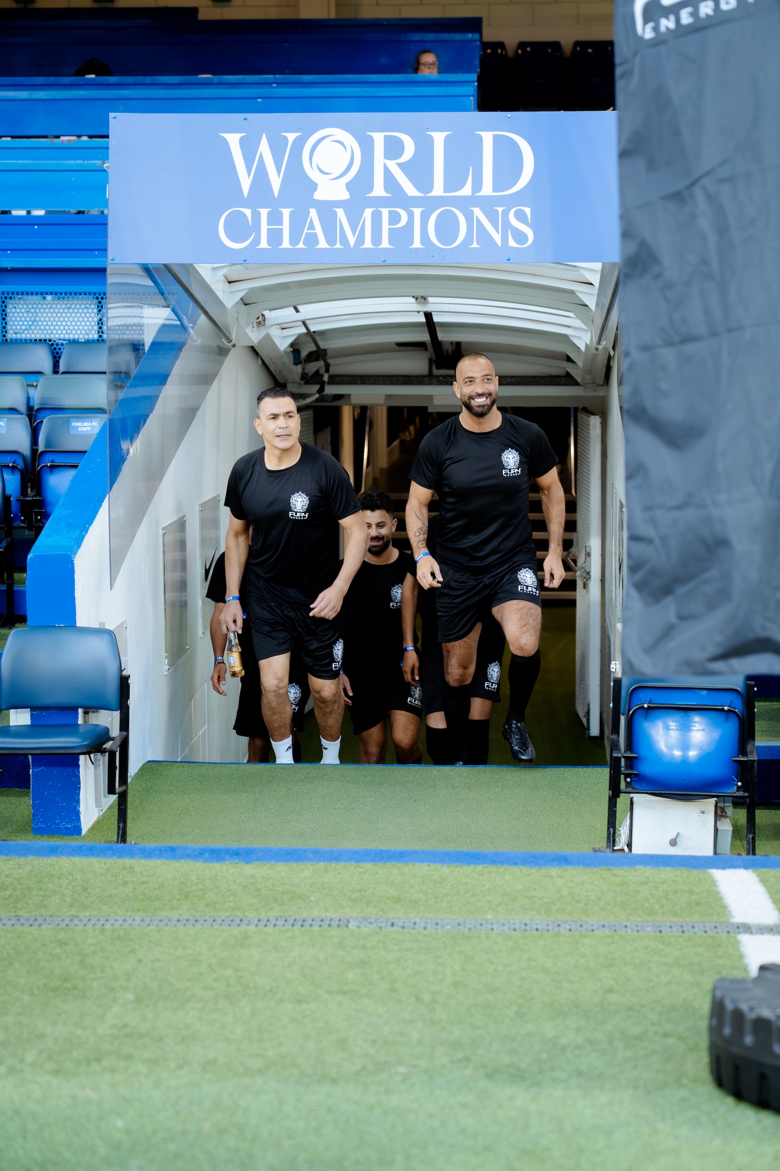 Mido walking out with the Fury Energy team through the players' tunnel, Stamford Bridge