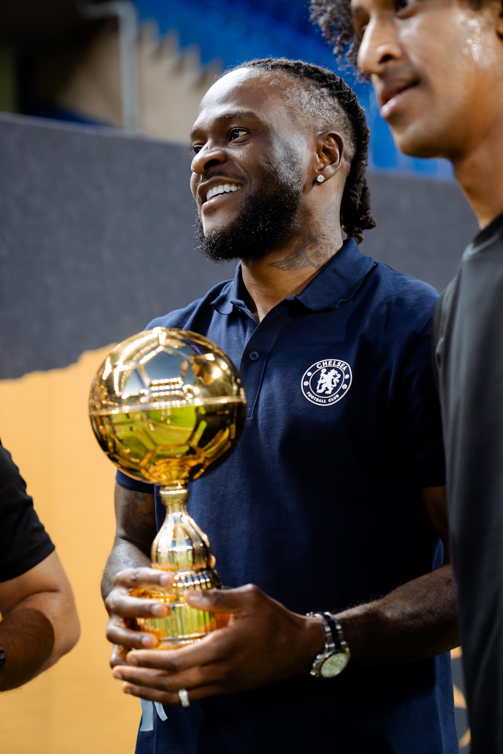 Victor Moses holding the trophy at the Fury Energy x Chelsea FC event, Stamford Bridge