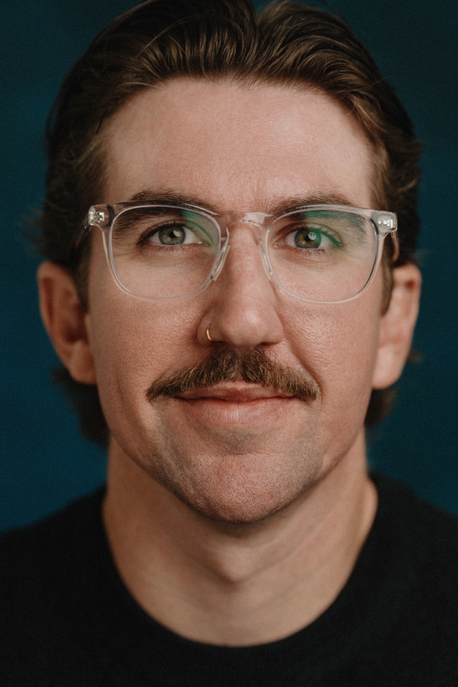 Team member headshot at the Maze portrait day