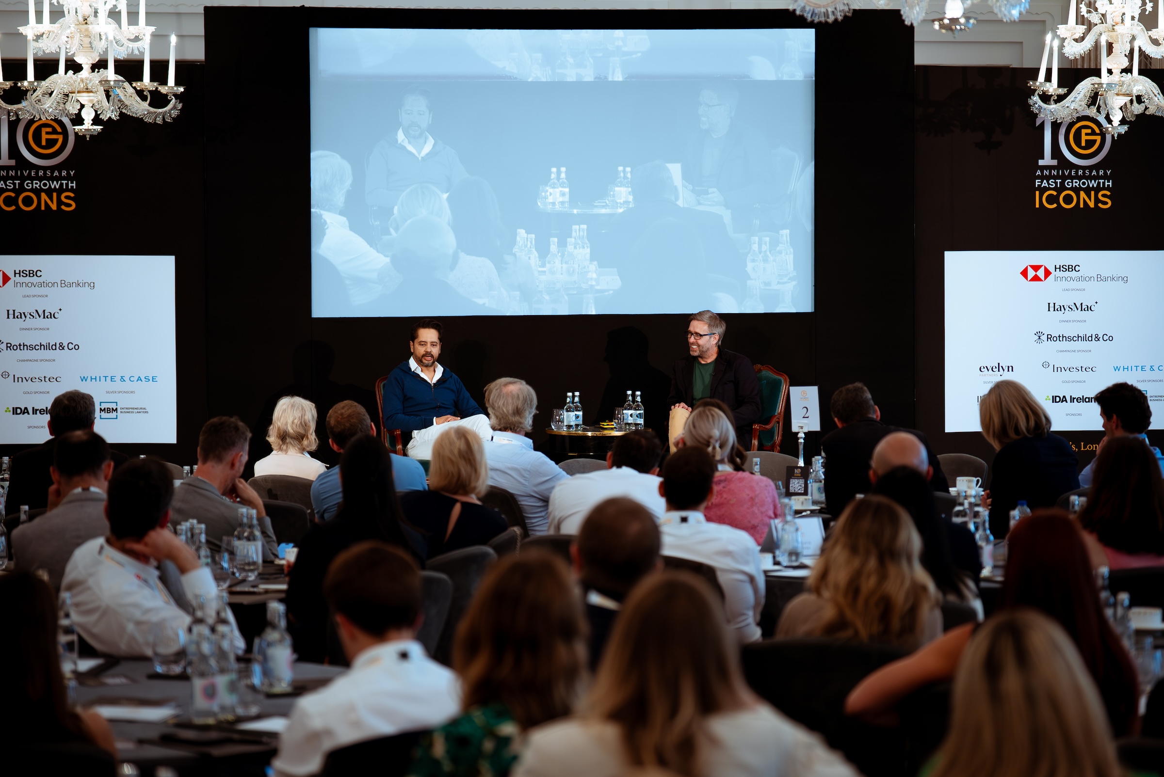 Fireside chat on stage at the Fast Growth Icons 10th Anniversary event, photographed by We Stream