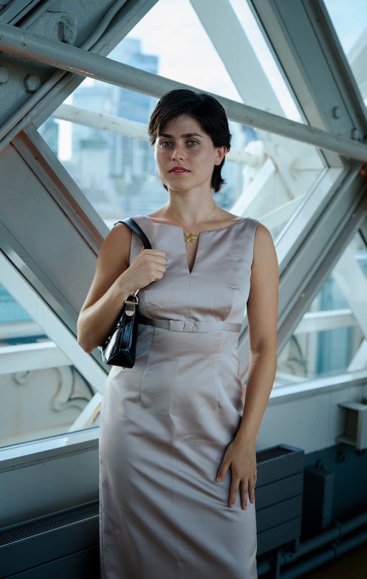 Guest portrait at an evening party event by Tower Bridge, London, photographed by We Stream