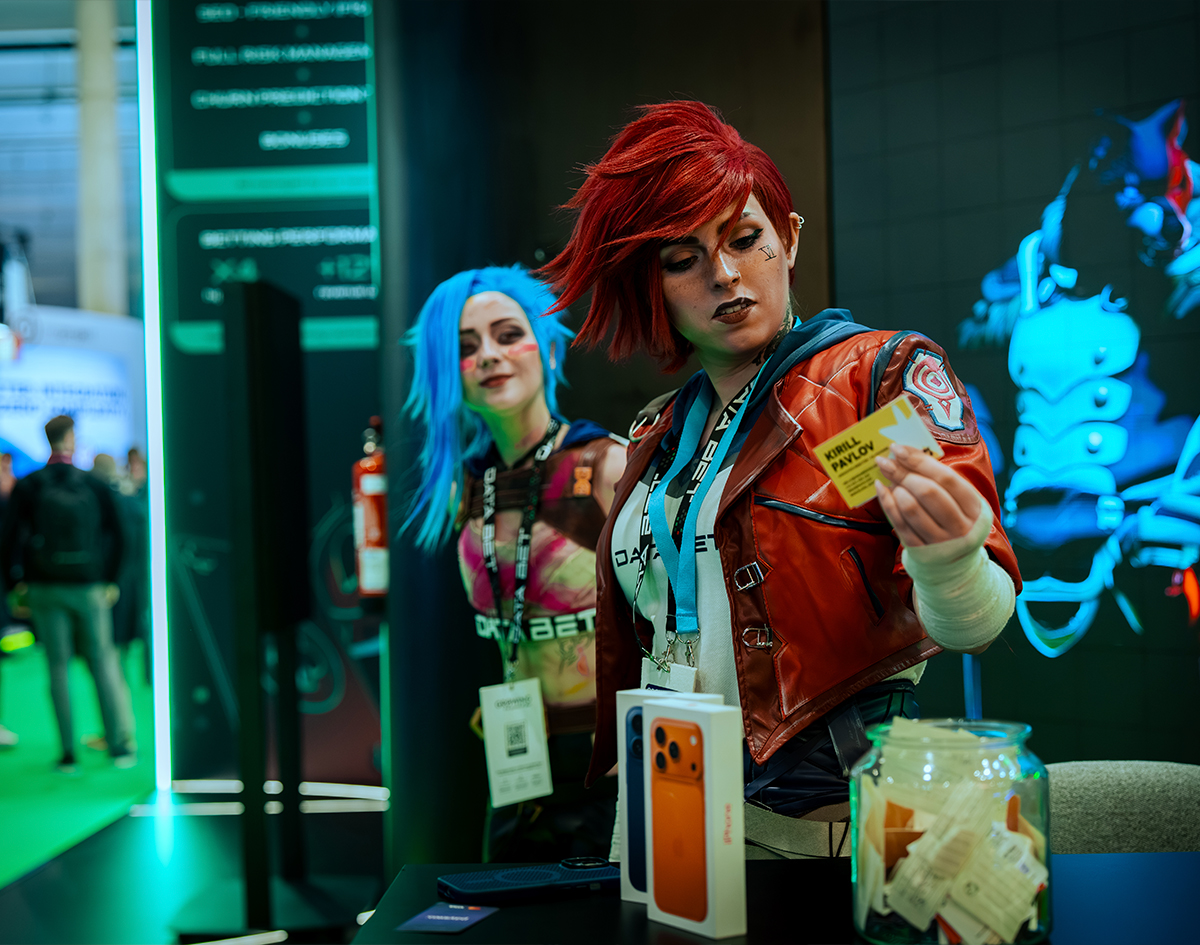 DATA.BET's cosplay hosts running a prize draw at their ICE Barcelona 2026 exhibition stand, photographed by We Stream