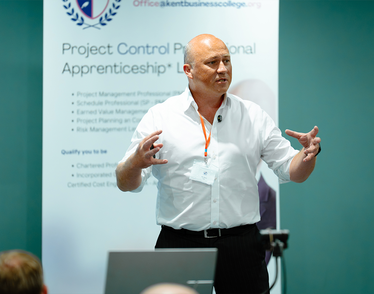 Speaker presenting at a Kent Business College apprenticeship event, corporate event photography by We Stream