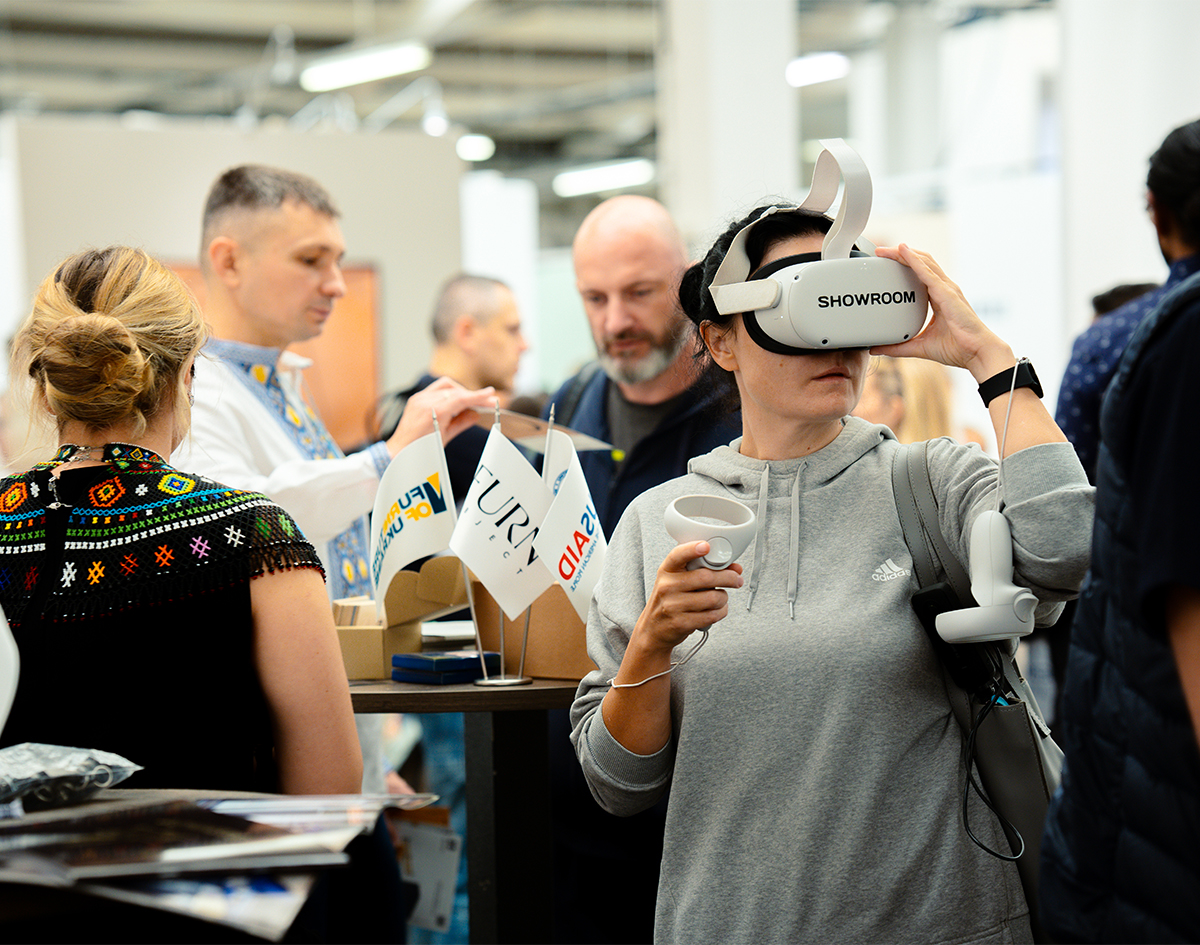 Visitor demoing a Meta Quest VR showroom experience at London Design Fair, event photography by We Stream