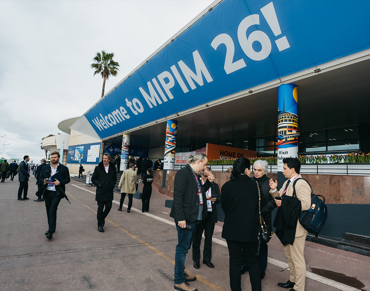 Attendees outside the MIPIM 2026 real estate conference entrance in Cannes, France, event photography by We Stream