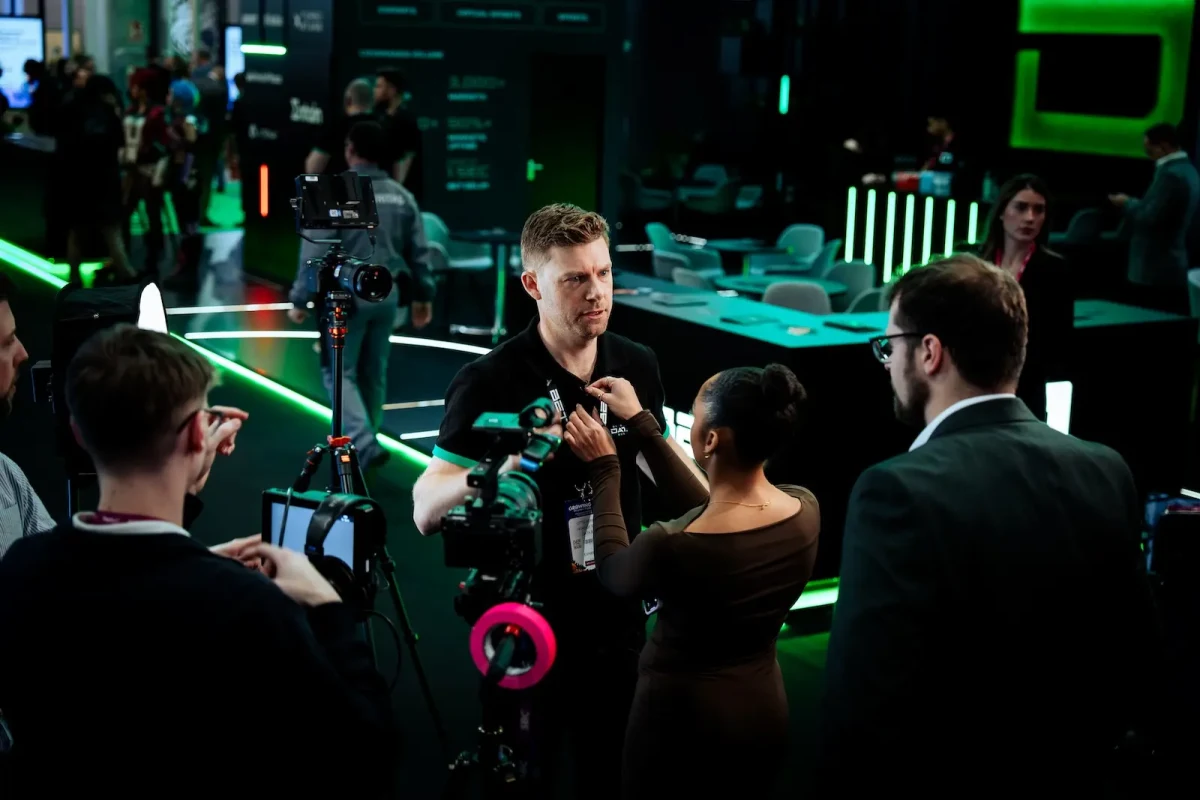We Stream camera operator filming an interview on DATA.BET's stand at ICE Barcelona 2026