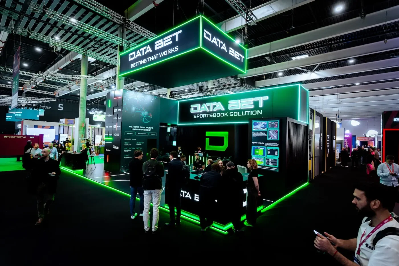 DATA.BET's stand with green neon lighting at ICE Barcelona 2026, Fira Gran Via, photographed by We Stream