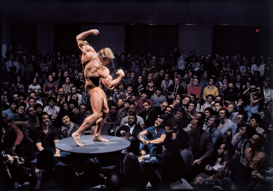 Arnold Schwarzenegger at the Whitney Museum, New York City, 1976.© Elliott Erwitt/Magnum Photos/Courtesy of Edwynn Houk Gallery, New York and Zürich