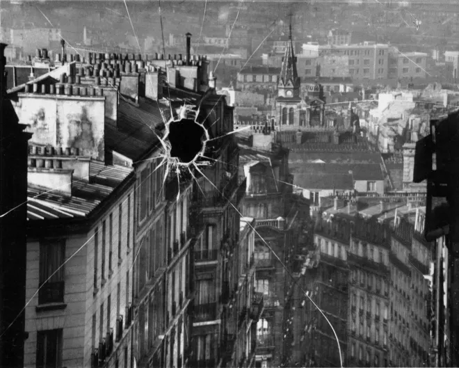 Photograph by Andre Kertesz. He accidentally dropped and broke his glass plate, but he ended up liking the effect.
