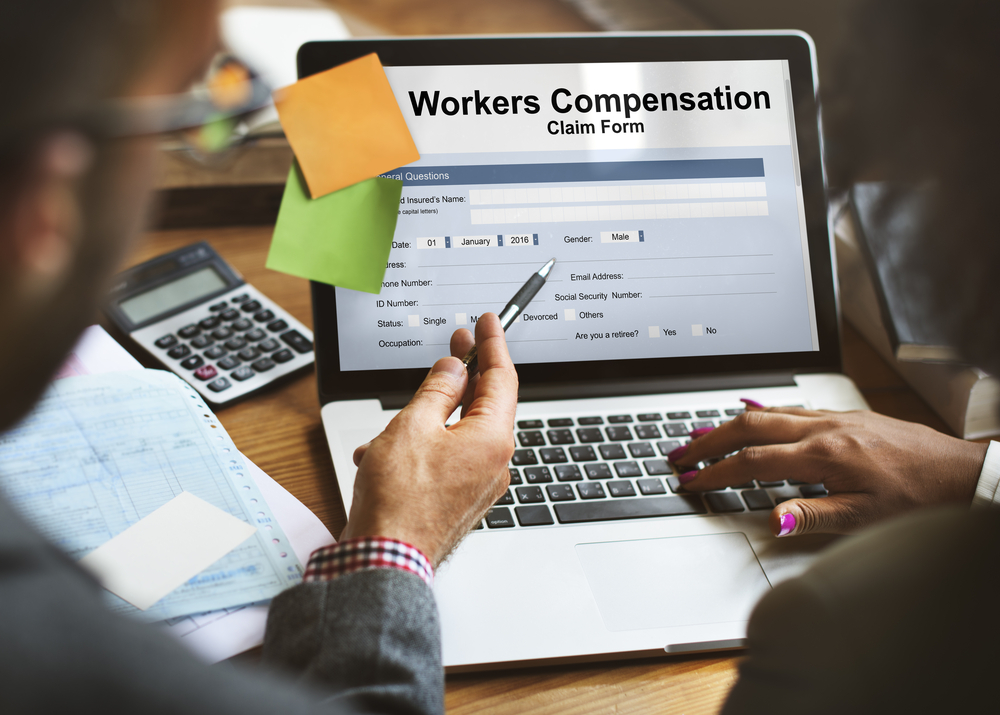 Workers Compensation Form Displayed On A Laptop