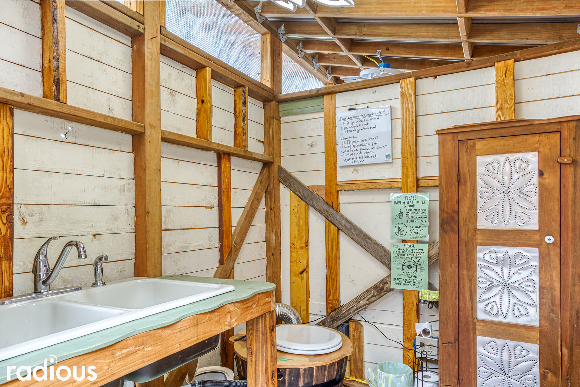 Innovative bathhouse with composting toilet system.