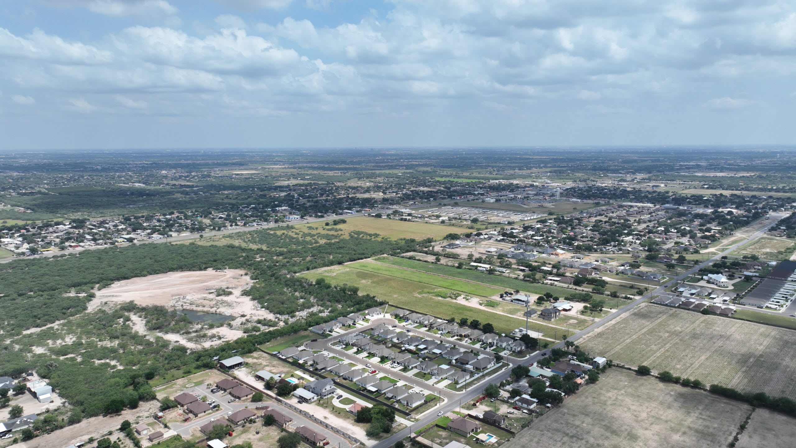 Aerial view of a finished Comarex street with covered carports