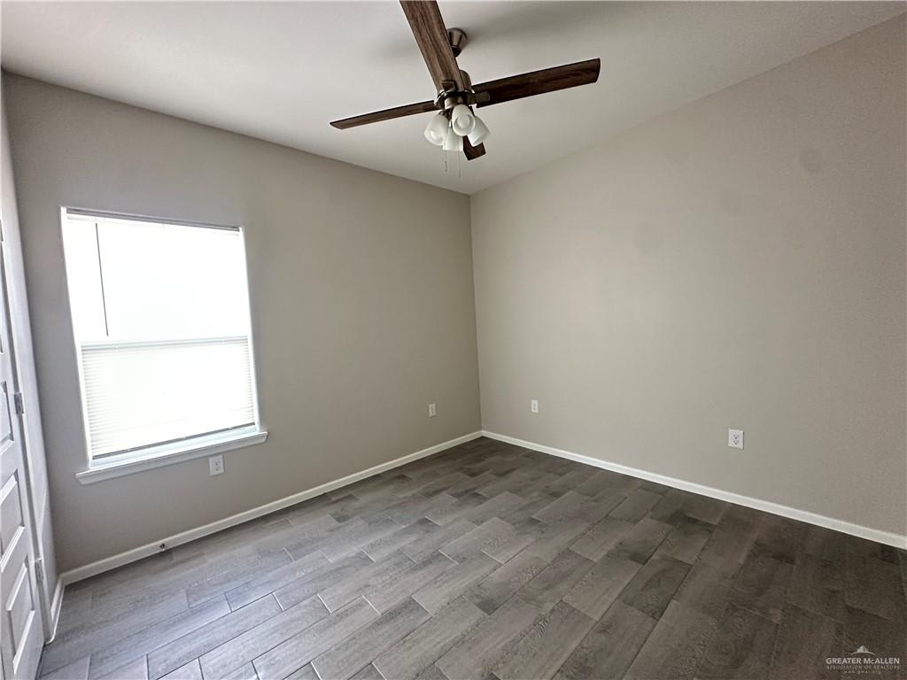 Riverside Tower bedroom with a ceiling fan and a single window