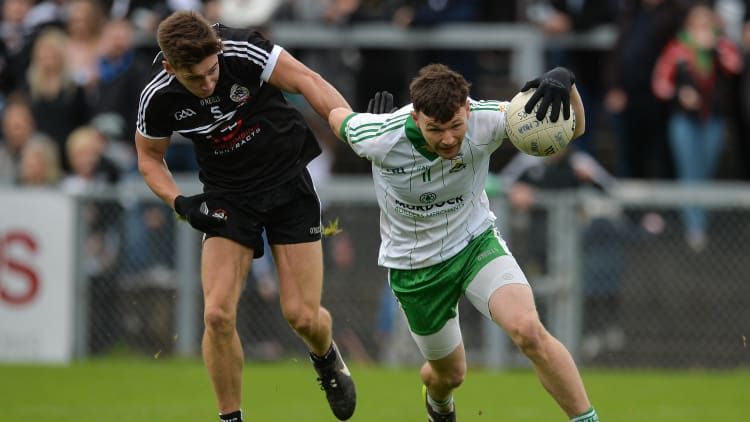 Donal O'Hare, Burren, and Aaron Branagan, Kilcoo, during the 2017 Down SFC Final.