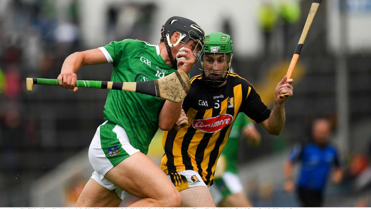 Gearoid Hegarty of Limerick in action against Joey Holden of Kilkenny during the All-Ireland SHC Quarter-Final at Semple Stadium.
