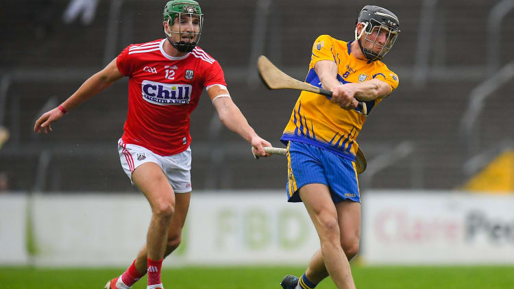 Shane Golden, Clare, and Aidan Walsh, Cork, in Co-op Superstores Munster Hurling League action at Cusack Park.