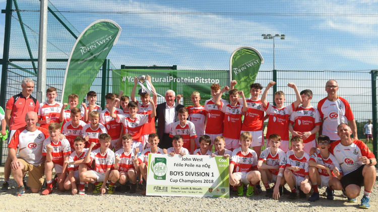 O Donovan Rossa GAC players with the John West Féile Peil na nÓg Boys Division 1 Cup after their victory over Burren GAC.